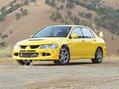 Купить глушитель, катализатор, пламегаситель Mitsubishi Lancer Evolution VII в Москве